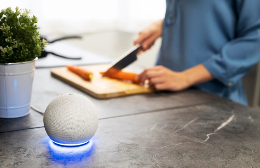 Smart speaker used for voice control in the kitchen while cooking.